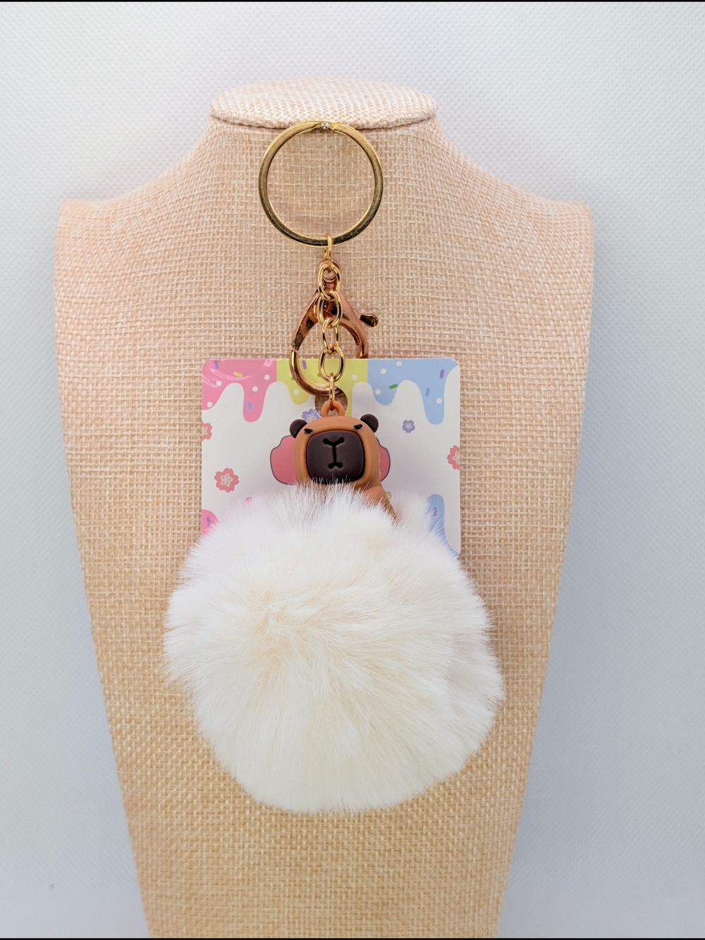 Capybara Atop Large Cream Pom Poof Keychain Bag Charm